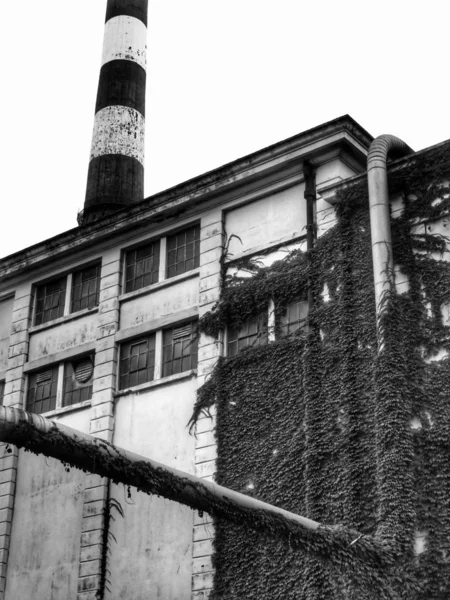 old factory building with black and white