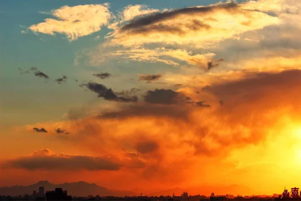 sunset in the sky with clouds