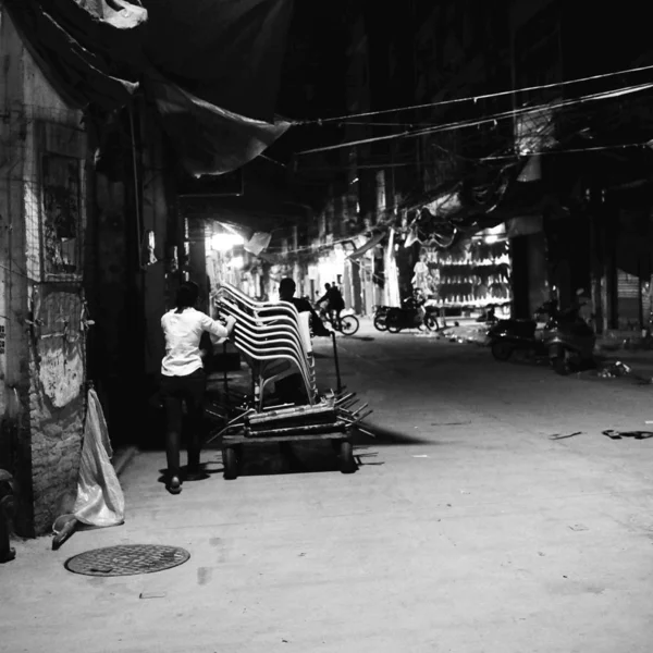 black and white people in the old town, vietnam