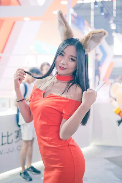 Asian female model posing during event