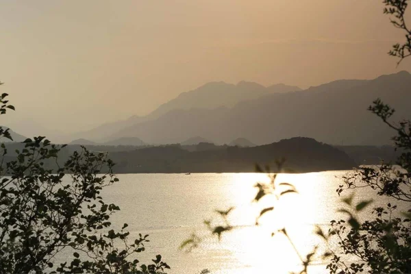 vintage landscape with silhouette of lake