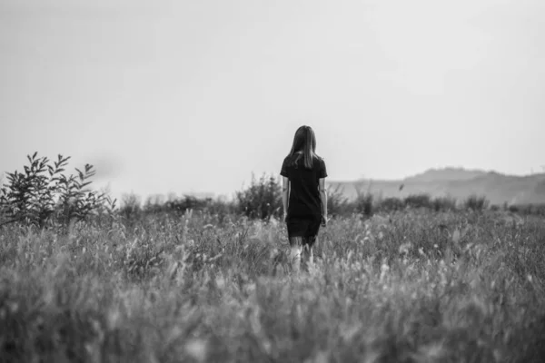 Young Woman Black Dress Standing Field Flowers — Stock Photo, Image