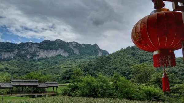 red hot balloon in the mountains