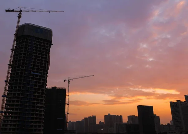 construction site , crane, urban scene
