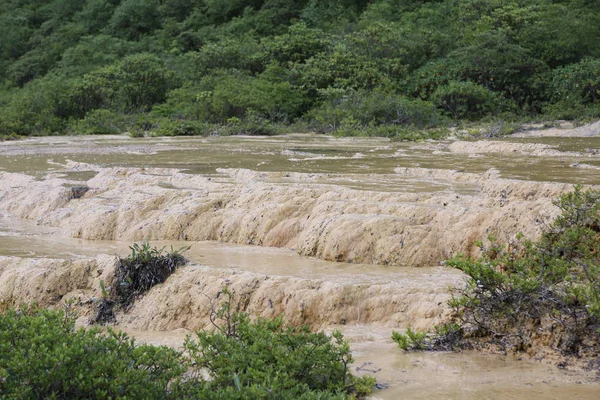 Streaming river in Huanglong Scenic Area