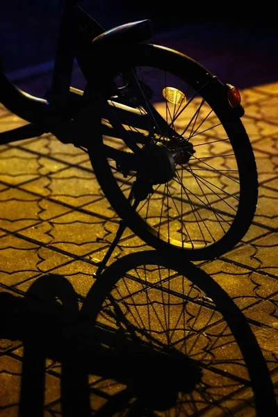 bicycle wheel on the black background