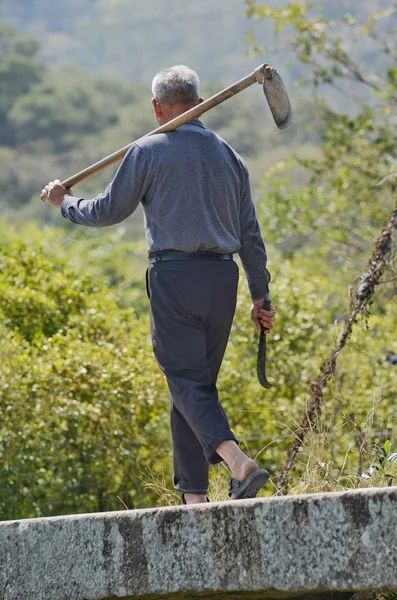 man with a rope in the park