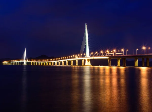 bridge across the river at night