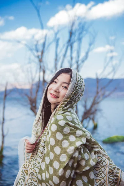 beautiful young woman in a scarf