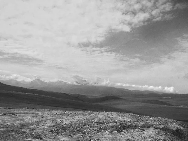 black and white clouds in the mountains