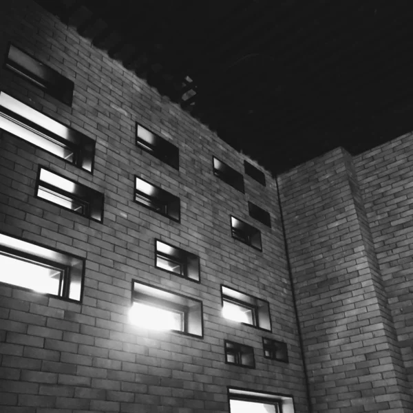 black and white photo of a modern building