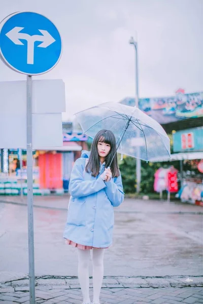 girl with umbrella in the city