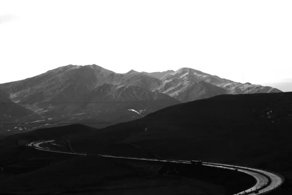 black and white mountain landscape with mountains