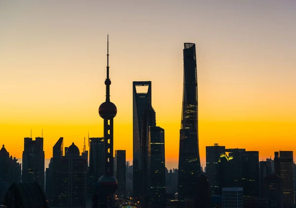 silhouette of a shanghai city with a beautiful sunset