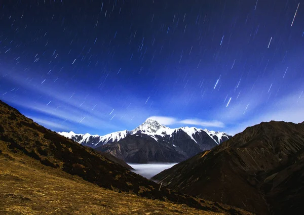 beautiful landscape with mountains and night sky