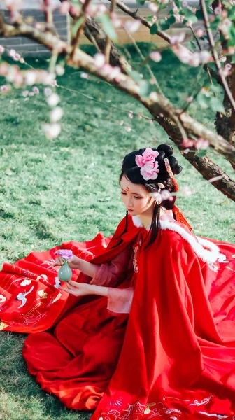 cute asian woman in Cherry Blossom garden alone