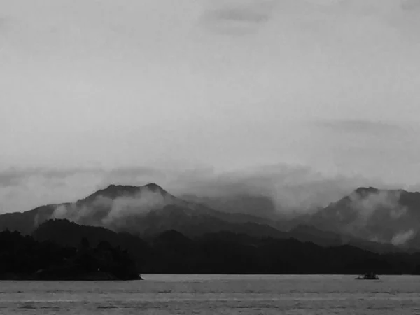 black and white photo of the sea