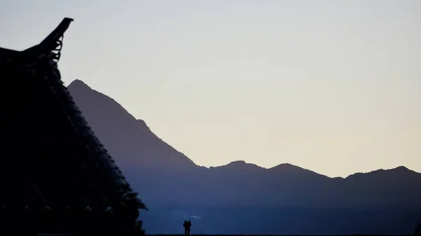 silhouette of a mountain landscape with a beautiful sunset