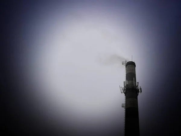 stock image smoke tower in the sky