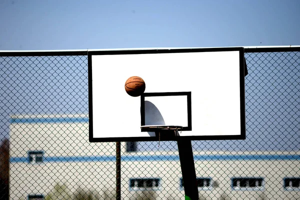 basketball court with ball and net