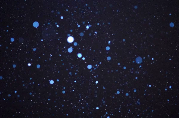 ボケの光と星の抽象的な背景 — ストック写真