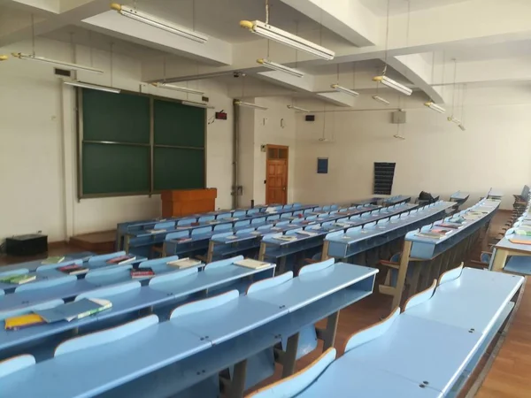 school classroom with chairs and table in the room