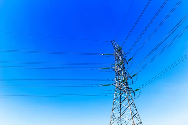 High Voltage Power Lines Transmission Tower Poles — Stockfoto