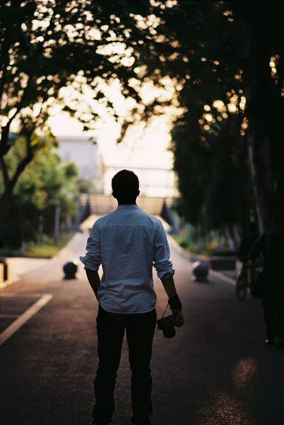 Man Black Shirt Backpack Walking Park — Stock Photo, Image