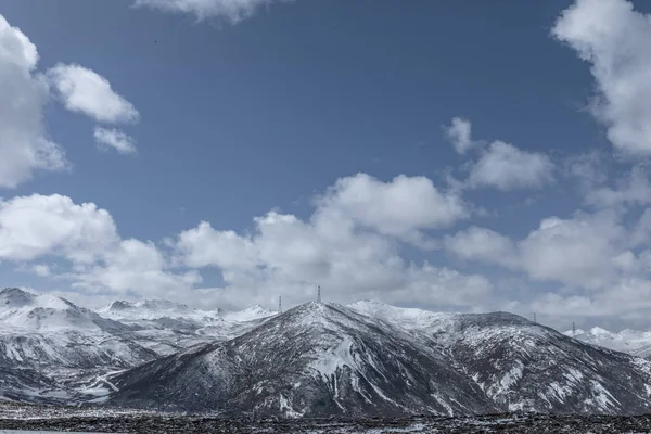 mountain landscape with snow and blue sky