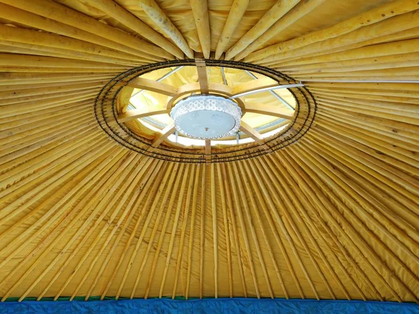 wooden ceiling with a window