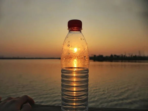water bottle with sea on the background