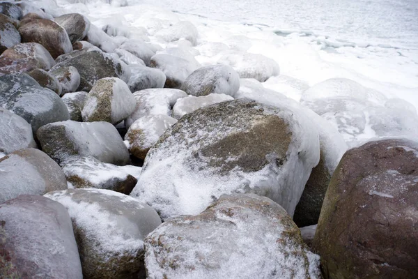 frozen rocks in the snow