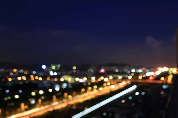 blurred night city skyline at twilight