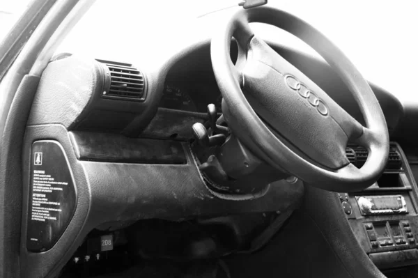 car steering wheel on the black background