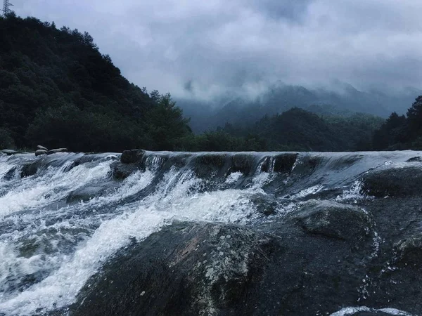 waterfall and waves in the mountains