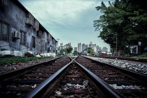 old railroad tracks in the city