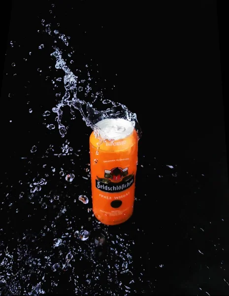 orange juice splash on black background