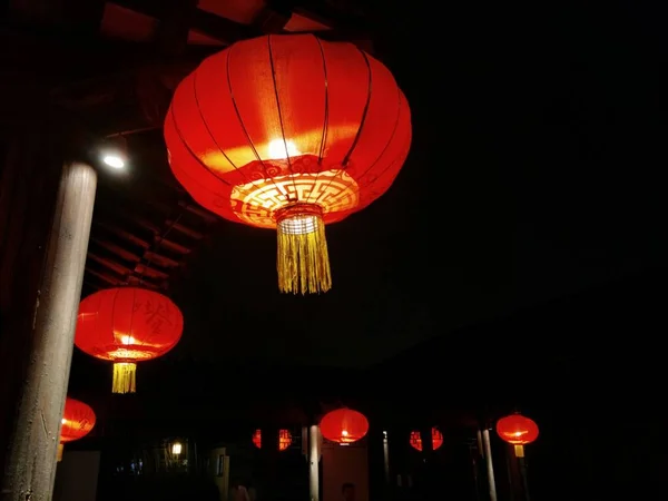 chinese lanterns hanging in the night