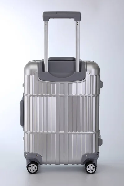 3d rendering of a plastic luggage on a white background