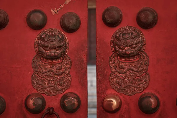 chinese door knocker in the form of a lion