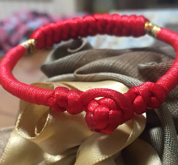 red and black leather bracelet