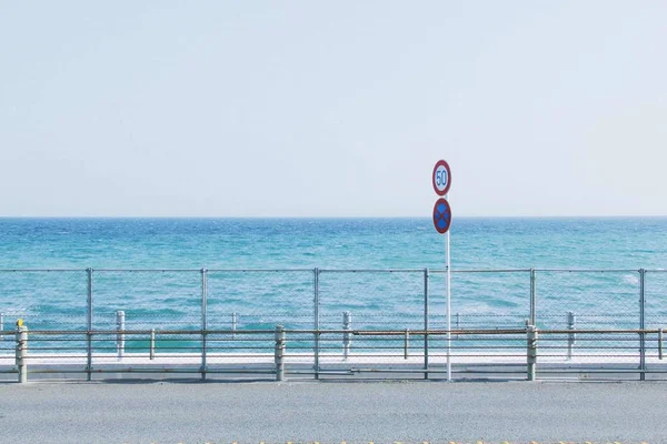 empty road sign on the sea
