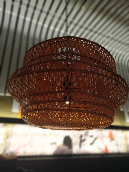 a close up of a restaurant lamp