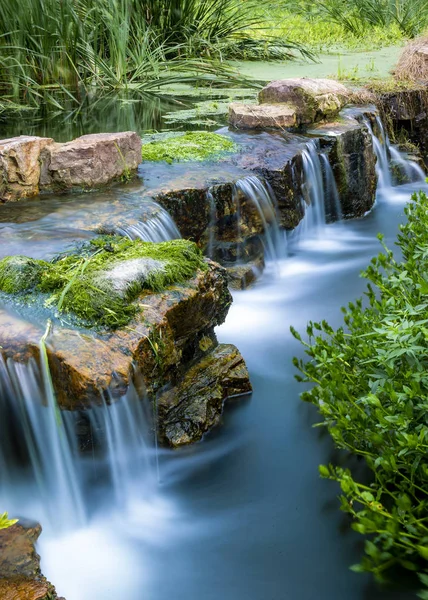 waterfall in forest, nature and river flow