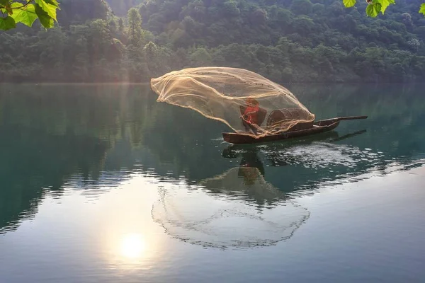 stock image the boat in the lake