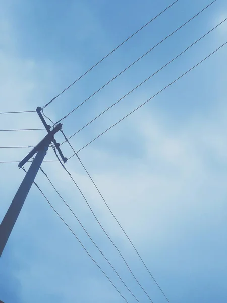 electric power line against the blue sky