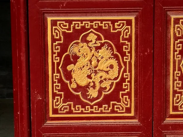 red chinese door in the city of thailand