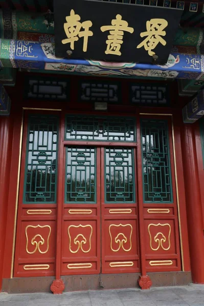 chinese style window with red door