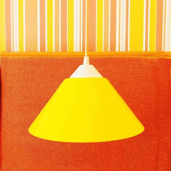 yellow lamp on the wall