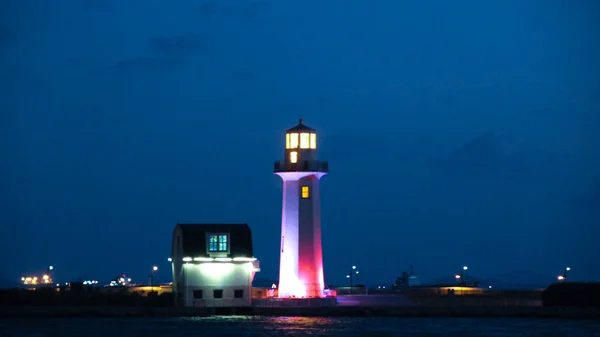 lighthouse at night, view of the sea